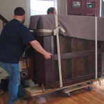 piano moving across house in Auckland